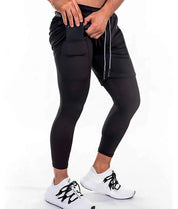 CALÇA DRY-FIT 2 EM 1 DE COMPRESSÃO