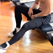 CALÇA DRY-FIT 2 EM 1 DE COMPRESSÃO